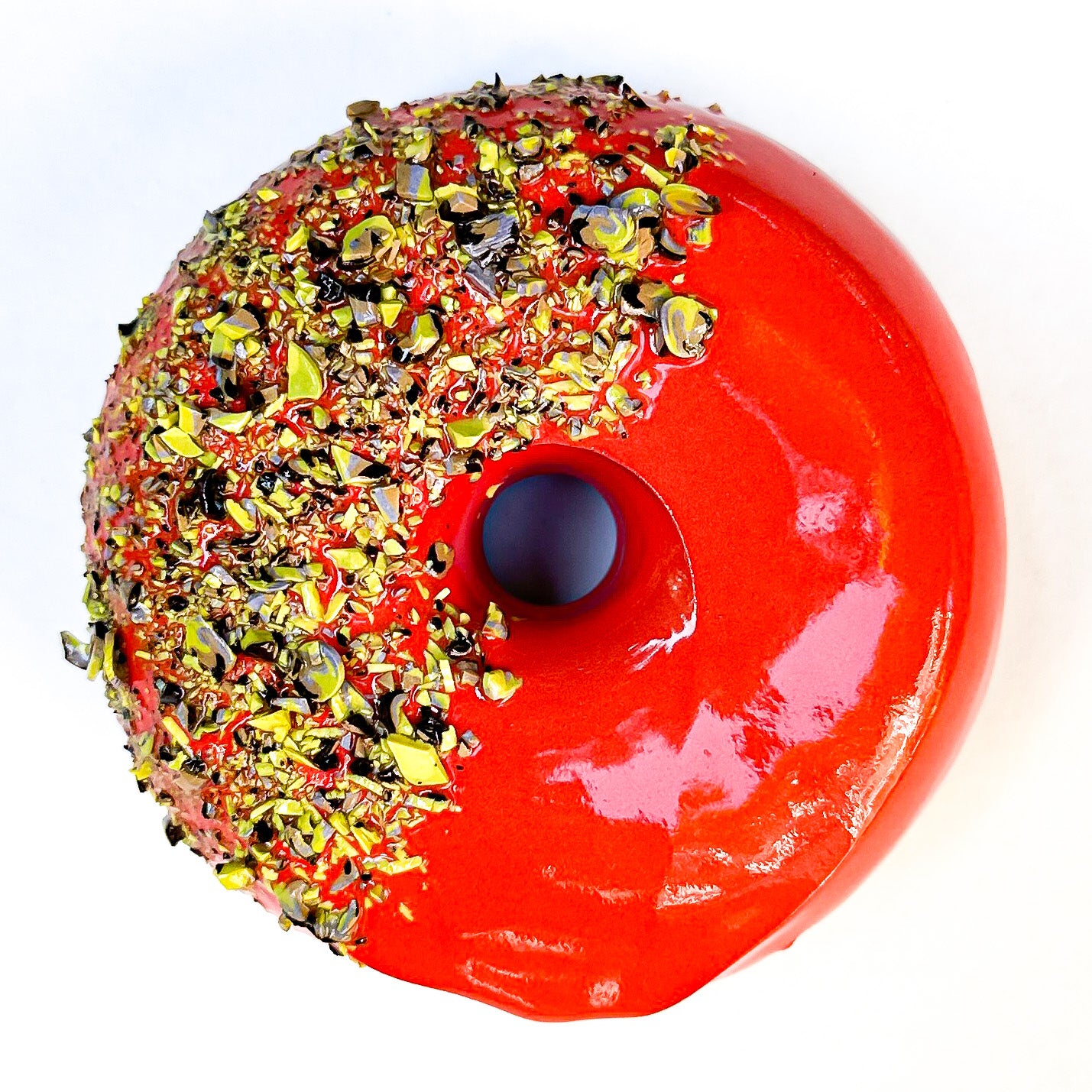 1972 Hibiscus Dip Half Pistachio Ceramic Donut