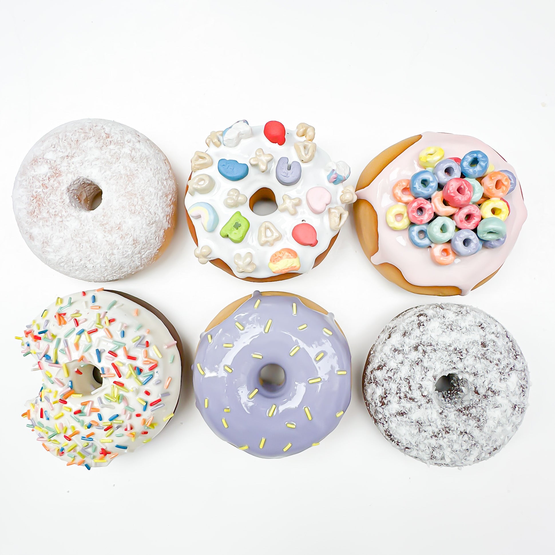 1899 Vanilla Rainbow Sprinkle Ceramic Donut with bite